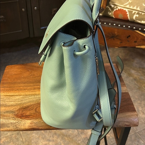 Kate Spade New York Sinch medium flap backpack. The color is light blue, EUC - Picture 4 of 11